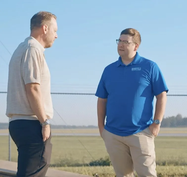 Chris McDevitt talking with a client